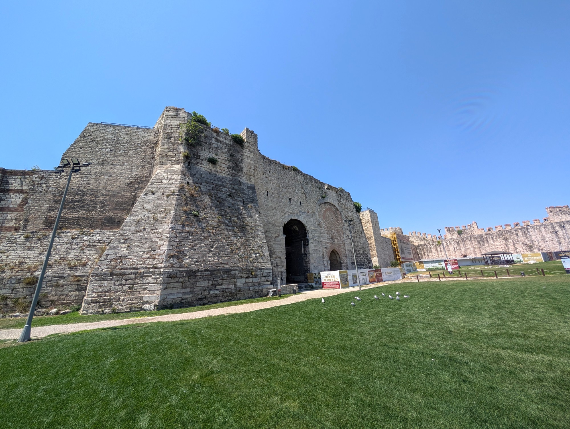 Golden Gate of the Theodosian Walls seen from the interior of Yedikule Fortresswith the Southern Marble Tower (Tower 9) visible on the left Golden Gate of the Theodosian Walls seen from the interior of Yedikule Fortresswith the Southern Marble Tower (Tower 9) visible on the left