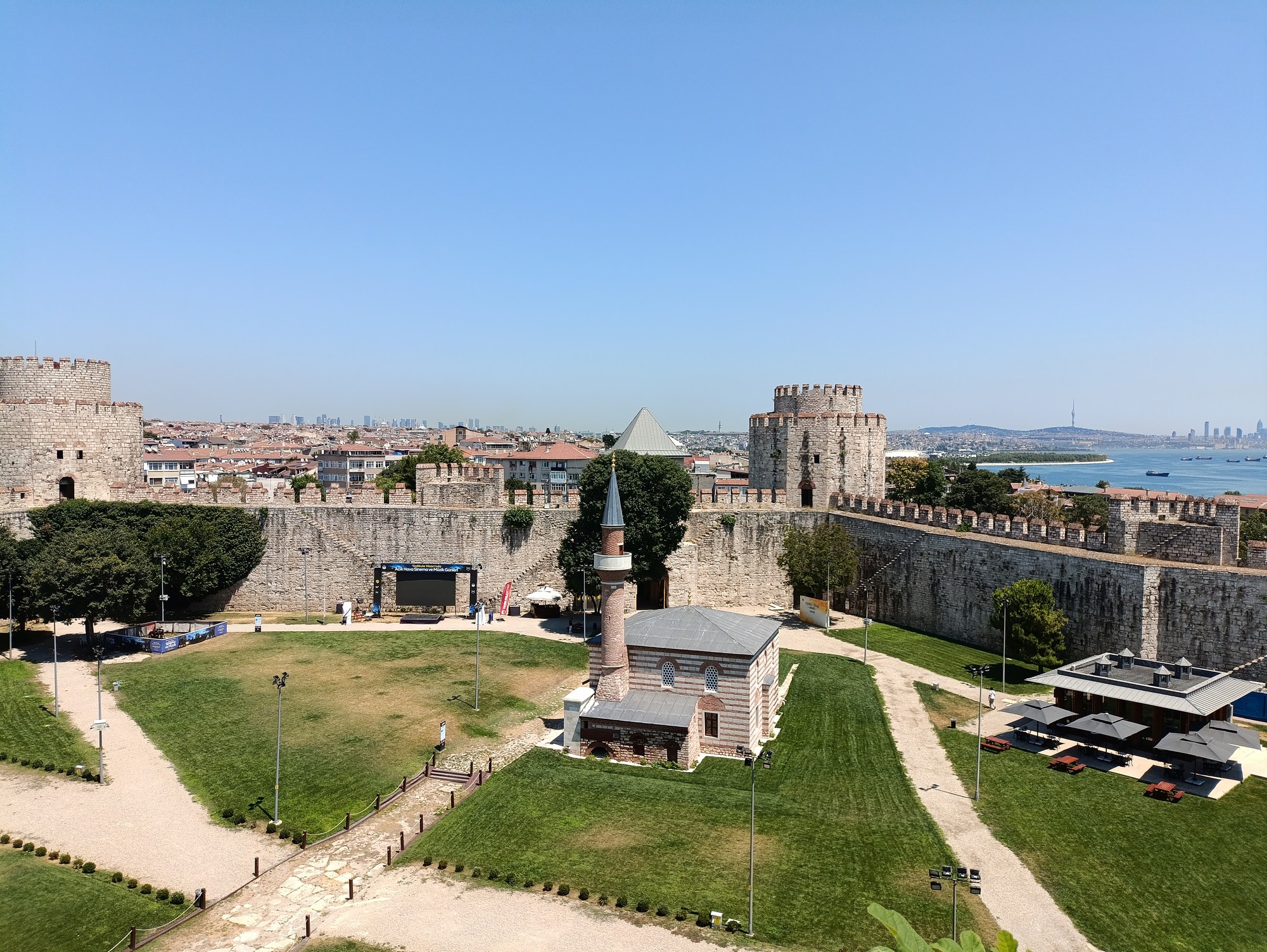 View from the top of Golden Gate towards the grounds of Yedukule Fortress with the Fatih Mosque in the center, and the Treasury Tower on the left and Tower of Inscriptions on the right View from the top of Golden Gate towards the grounds of Yedukule Fortress with the Fatih Mosque in the center, and the Treasury Tower on the left and Tower of Inscriptions on the right